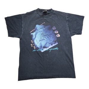 ☆New Era☆ Newspaper Collage T-Shirt Off White 14699257 Limited Edition Pop Culture T-Shirts, Fandom Tees | Shirtpunch