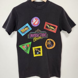 Vintage 80er Jahre Universal Studios Collage Rundhals T-Shirt / Made in USA / Single Stitch / Größe S