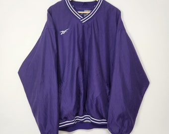 Giacca vintage Reebok in nylon con giacca a vento e scollo a V/taglia XL