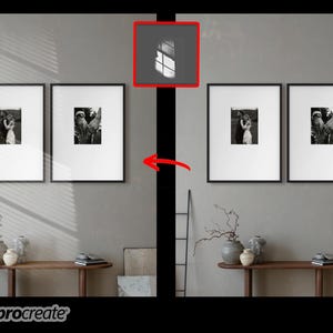 May include: Two framed black and white photographs hang on a grey wall, with a wooden console table below. The photos depict a couple and hands. Decorative vases and books are on the table. The image has a shadow of a window.
