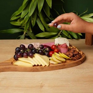 Auténtica tabla de cortar de madera de olivo.