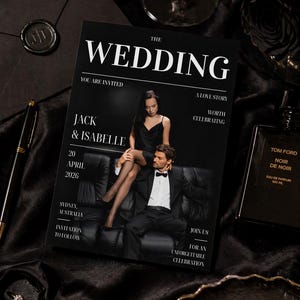 May include: A black wedding invitation with the text "THE WEDDING" and the names "Jack & Isabelle." The invitation includes the date April 20, 2026, and the location Sydney, Australia. A bottle of Tom Ford Noir De Noir perfume is also visible.