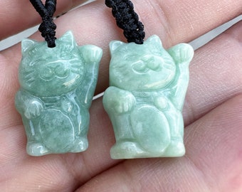 Natural A-grade jadeite, hand-carved lucky cat. Cute shape, light green.