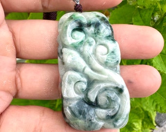Only this one. Grade A natural landscape style jadeite pendant. The engraving is a pattern that symbolizes good luck in everything.