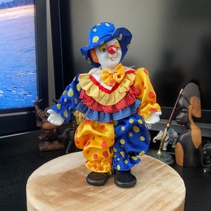 Collectible porcelain clowns clearance