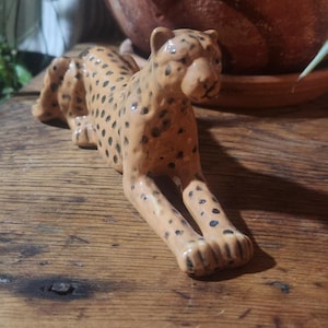 Ceramic leopard statue