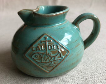 Prinknash pinched sauce jug in teal green