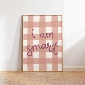 May include: A pink and white gingham print with the text "* i am smart" in a pink cursive font.
