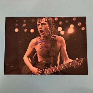 Angus Young - AC/DC signiertes Foto authentisches Autogramm mit COA