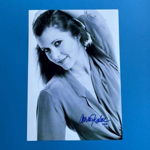 Fotografía autógrafa auténtica firmada por Carrie Fisher con certificado de autenticidad