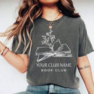 a woman wearing a t - shirt that says your club name book club