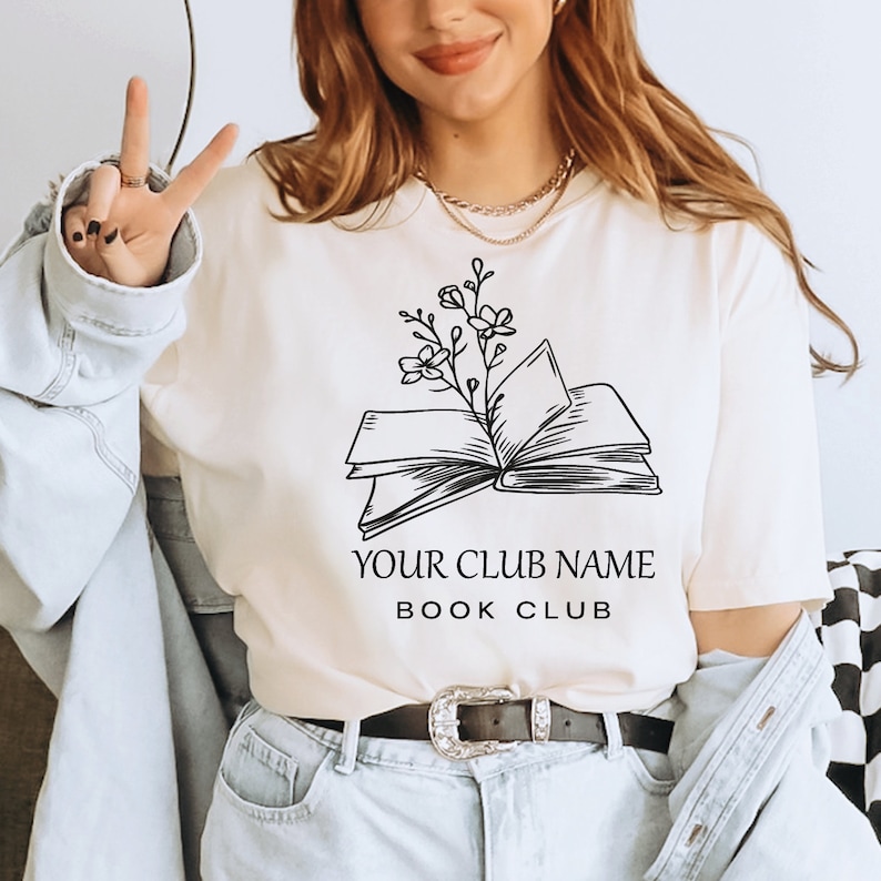 a woman wearing a t - shirt that says your club name