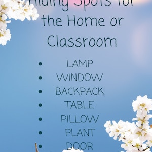 May include: A list of hiding spots for the home or classroom, written in black text on a blue background with white flowers. The list includes: Lamp, Window, Backpack, Table, Pillow, Plant, Door.