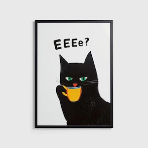 May include: A framed art print featuring a black cat with green eyes drinking from a yellow mug. The cat is silhouetted against a white background, with the text "EEEE?" above its head.
