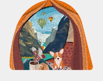 May include: A jigsaw puzzle depicting a cozy camping scene with a view of a mountain range and hot air balloons. A dog sits on a patterned rug inside the tent, while a person enjoys a warm drink.