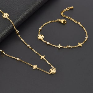 Louis vuitton on sale necklace etsy