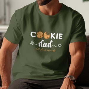 May include: A green t-shirt with the text "Cookie dad I'll love you a latte" and a graphic of three chocolate chip cookies.