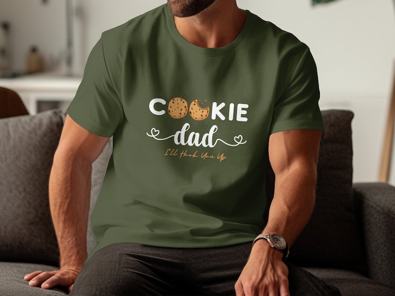 May include: A green t-shirt with the text "Cookie dad I'll love you a latte" and a graphic of three chocolate chip cookies.