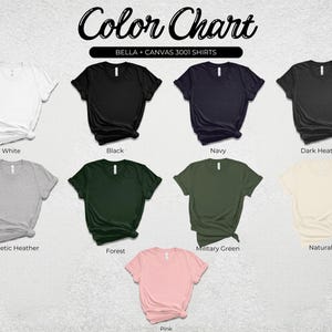 May include: A color chart displays various t-shirt colors, including white, black, navy, and dark heather. The chart also shows athletic heather, forest green, military green, natural, and pink t-shirts. The text "Color Chart" and "BELLA + CANVAS 3001 SHIRTS" are at the top.
