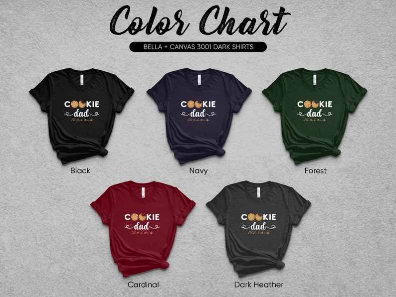 May include: A color chart showing different Bella + Canvas 3001 dark t-shirt colors. The shirts feature a graphic that says "Cookie Dad" with a cookie design. The colors shown are black, navy, forest, cardinal, and dark heather.