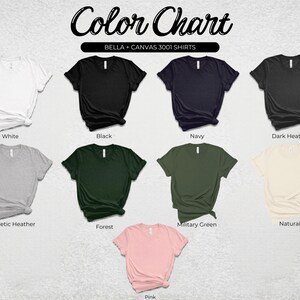May include: A color chart displays various t-shirt colors, including white, black, navy, and dark heather. The chart also shows athletic heather, forest green, military green, natural, and pink t-shirts. The text "Color Chart" is at the top.