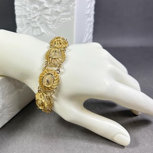 Vintage gold-colored link bracelet/tennis bracelet in Op Art style