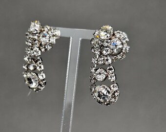 Vintage Art Deco clip-on earrings with faceted clear crystals.