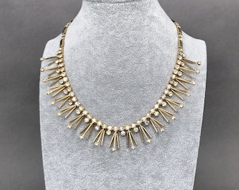 Vintage SARAH COVENTRY gold-colored choker necklace with faceted diamond crystals.