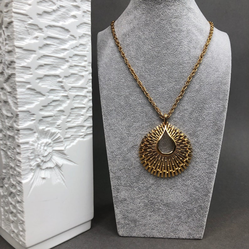 Vintage TRIFARI crown signed gold tone pendant with chain. image 1