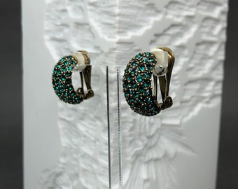 HEIDI DAUS signed clip-on earrings/earrings with emerald green rhinestones
