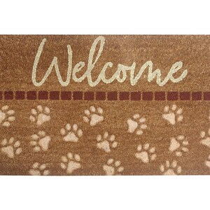 May include: Brown coir doormat with the word "Welcome" in white script and a pattern of tan paw prints.