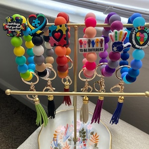Llavero de pulsera para concienciar sobre el autismo