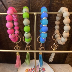 Llavero de pulsera brillante