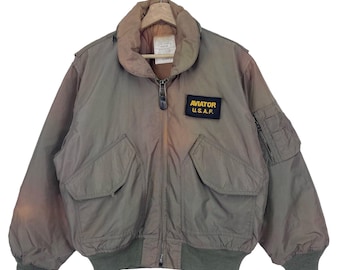Chaqueta vintage de los años 80 con parches de bombardero volador MA1 de la USAF, estilo militar/aéreo/de la Fuerza Aérea, desteñida por el sol, para climas fríos, talla grande
