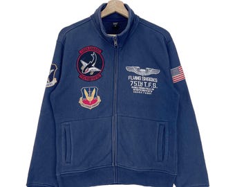 Chaqueta vintage de algodón Avirex Moody Field con parches de cremallera y estampado de tiburón tigre de la USAF, suéter descolorido, talla mediana