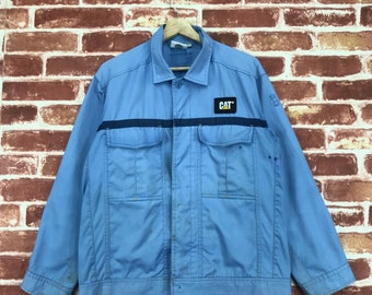 Chaqueta vintage de algodón con botones y parches del logotipo de Caterpillar Worker, talla mediana