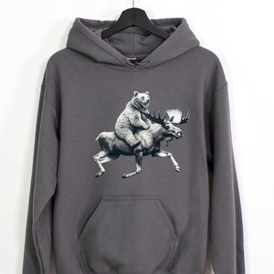 Funny Moose Hoodie, Bear Riding Moose Hooded Sweatshirt, Weird Maine Sweatshirt, Gift for Animal Lovers, Unisex Hoodie Maine Apparel