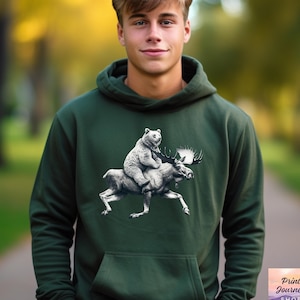 Funny Moose Hoodie, Bear Riding Moose Hooded Sweatshirt, Wildlife Hoodie, Gift for Animal Lovers, Unisex Hoodie Maine Apparel, Cabin Sweater
