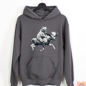 Funny Moose Hoodie, Bear Riding Moose Hooded Sweatshirt, Wildlife Hoodie, Mountain Lover Gift, Colorado Sweatshirt, Woodland Hoodie