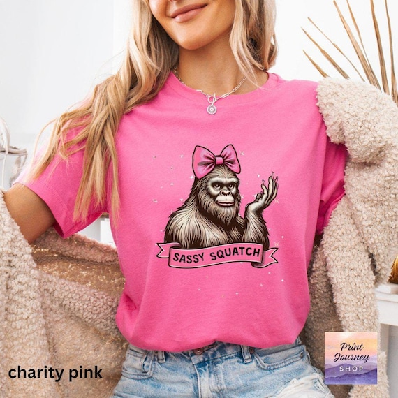 Funny Sassy Sasquatch T-Shirt, Cute Bigfoot with Bow Tee, Fun Sasquatch Graphic Coquette Tee, Unique Bigfoot Design, Gift for Women