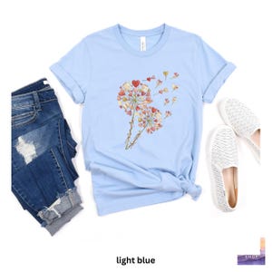 Light Blue Graphic Tee, Heart Dandelion Design Shirt, Casual Spring Wear, Cute Floral T-Shirt, Women's Summer Top