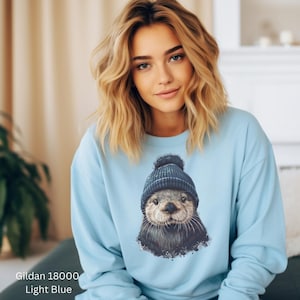 Cute Otter Sweatshirt, Winter Animal Graphic, Cozy Crewneck, Fun Otter Lover Gift, Unique Otter Art Pullover, Plush Warm Sweater