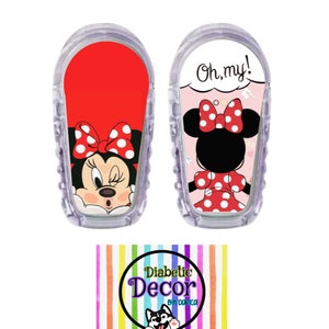 May include: Two red and white Minnie Mouse themed stickers for a medical device. The stickers feature a cartoon image of Minnie Mouse with the text "Oh, my!" on one sticker. The stickers are from Diabetic Decor by Danica.