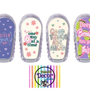 May include: Four clear plastic medical device covers with inspirational quotes. The covers feature the phrases "Never Give Up," "Take it one day at a time," "Good Things Are Ahead," and "Deep Breath You got this." The Diabetic Decor logo is at the bottom.