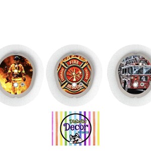 May include: Three round white stickers with different firefighter themed designs. The first sticker features a firefighter in a fire scene. The second sticker features a red fire department emblem with the words "Fire", "Courage", "Honor", and "Rescue". The third sticker features a red fire truck with a ladder extended.