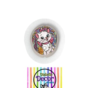 May include: A white diabetic patch with a colourful stained glass design featuring a cartoon white cat with pink bow and a pink flower in her ear. The text "Diabetic Decor by Domica" is on a rainbow striped background.