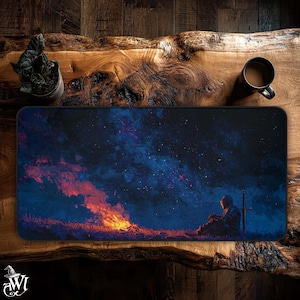 May include: A rectangular black mousepad featuring a digital art scene of a knight sitting near a campfire under a starry sky. The artwork is predominantly blue, orange, and black.