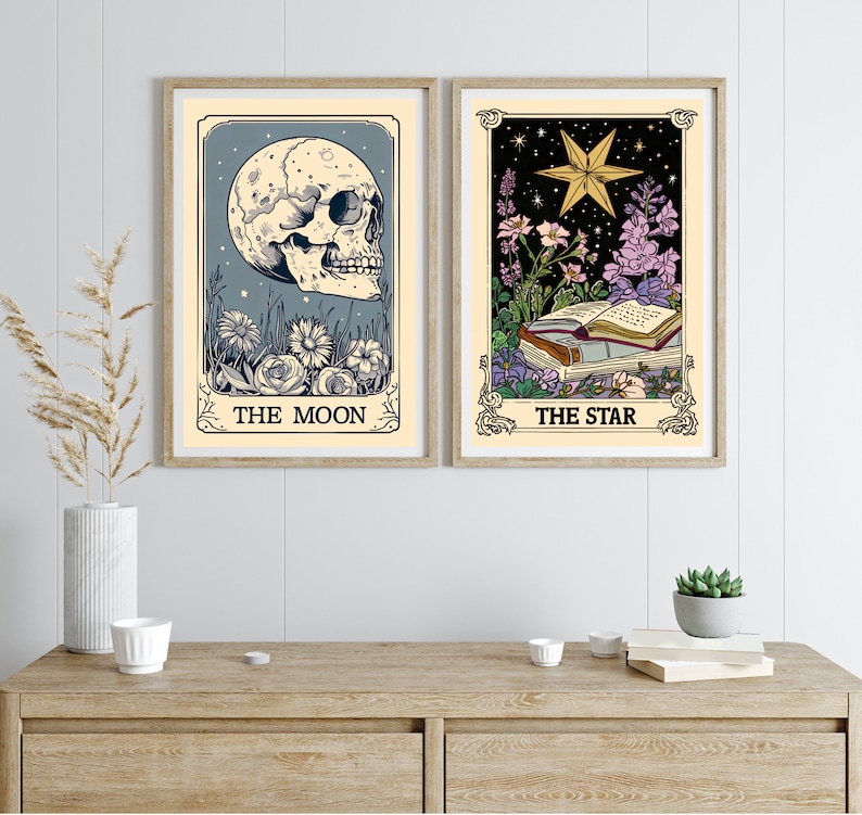May include: Two framed tarot card prints, one with a skull and the text "THE MOON" and the other with a star and the text "THE STAR".