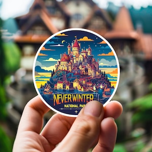 May include: A round sticker with a colorful illustration of a castle on a hilltop. The sticker has the text "NEVERWINTER NATIONAL PARK" on the bottom.