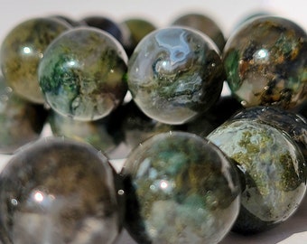 May include: A bracelet composed of polished, spherical moss agate beads. Each bead features a unique, translucent to opaque composition with deep forest green, earthy brown, and milky white inclusions, creating a natural, marbled appearance.